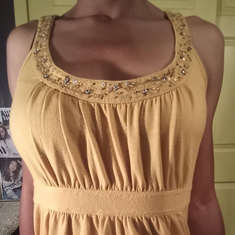 New York and Co. yellow tank top with sequin bead collar detailling.